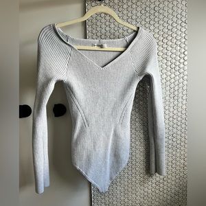 Off shoulder A&F knit bodysuit with buttons on cuff. Worn a handful of times.